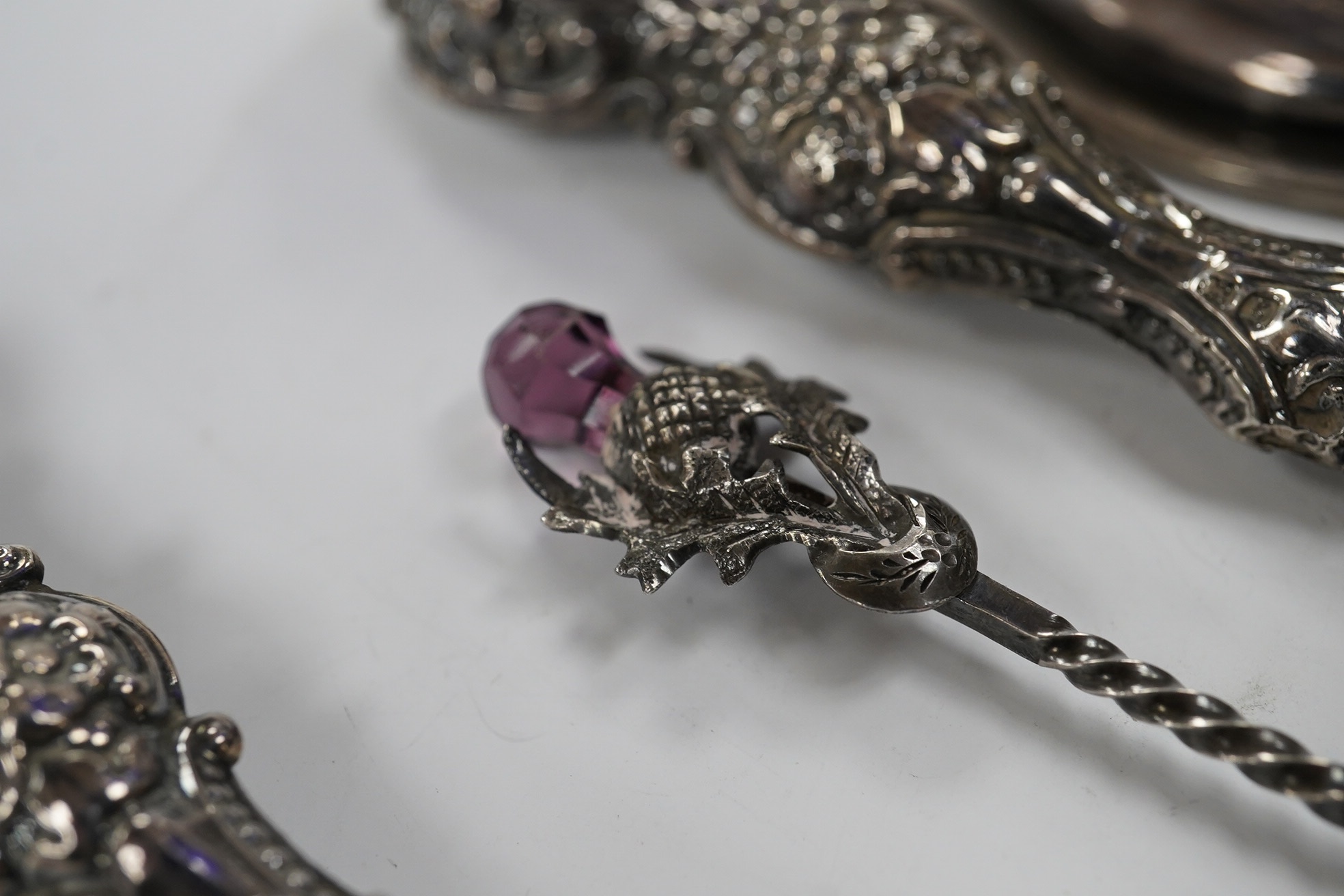 A small group of assorted silver items including mounted blue glass spill vase, 17.2cm, mounted shoe horn and button hook and a trinket dish, together with two other items. Condition - poor to fair